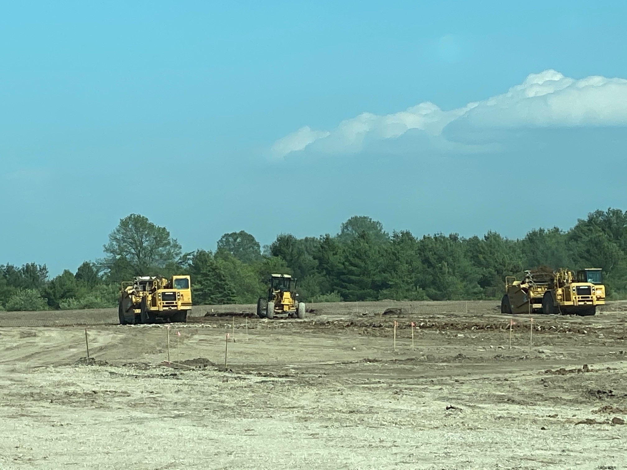 Leveling ground during site prep Equipment leveling the ground during site prep